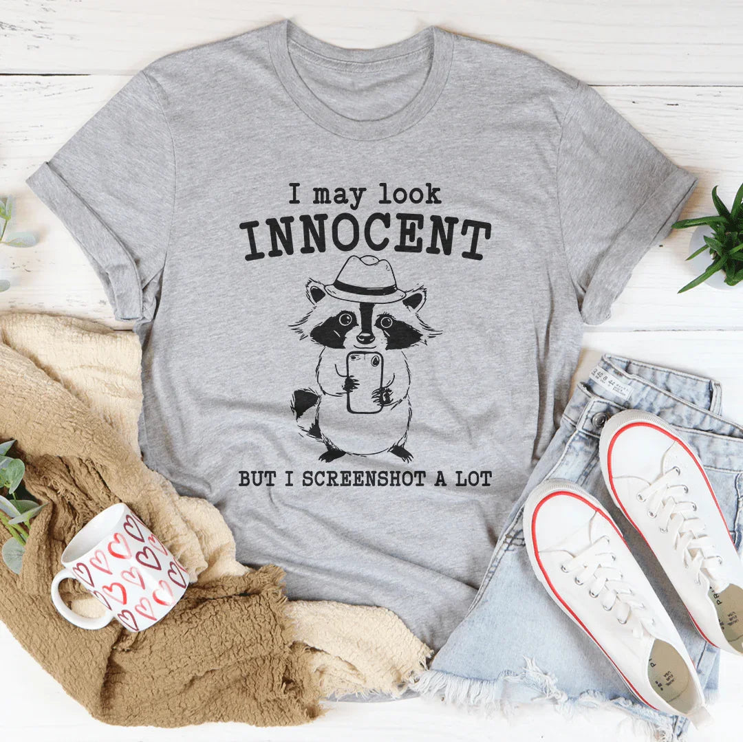 I May Look Innocent But I Screenshot A Lot Tee